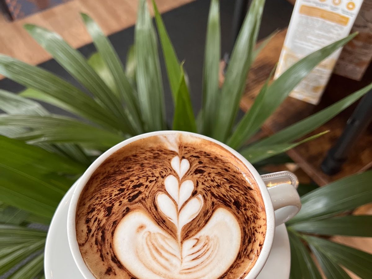 Latte art in a white cup at Datsé’s Café and Cakes, Cavan Town